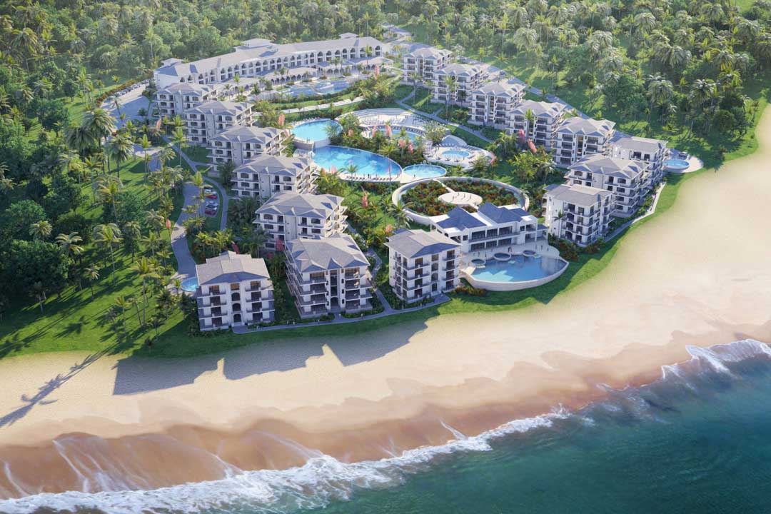 A birds eye 3d rendering of a large resort on a pristine beach, in a tropical setting